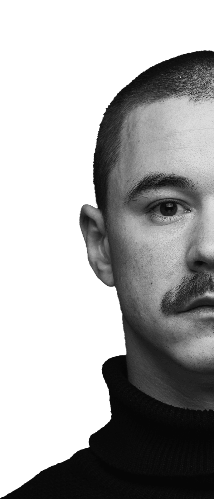 black and white portrait of Mateusz Hallala, straight-on, transparent background, left half only